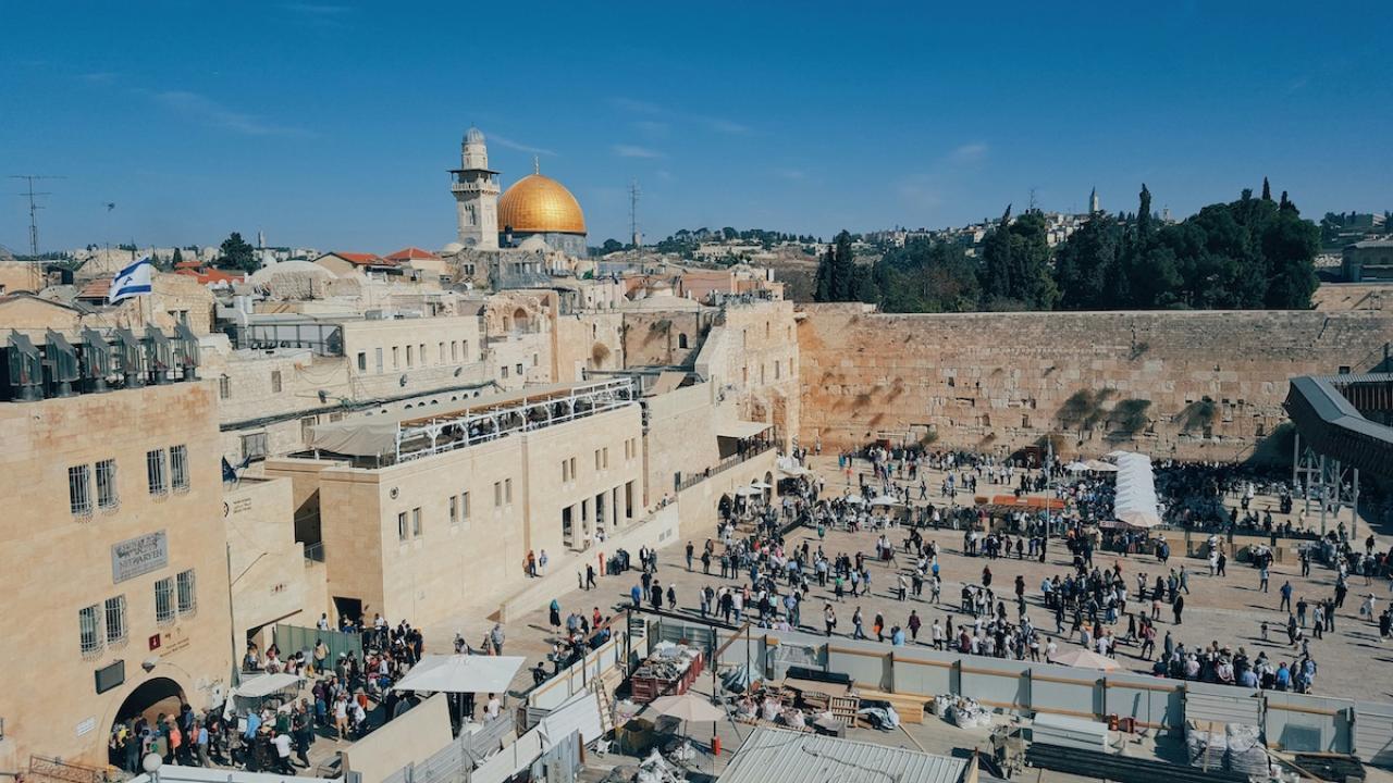View of the Western Wall Plaza in Jerusalem with the Dome of the Rock in the background.